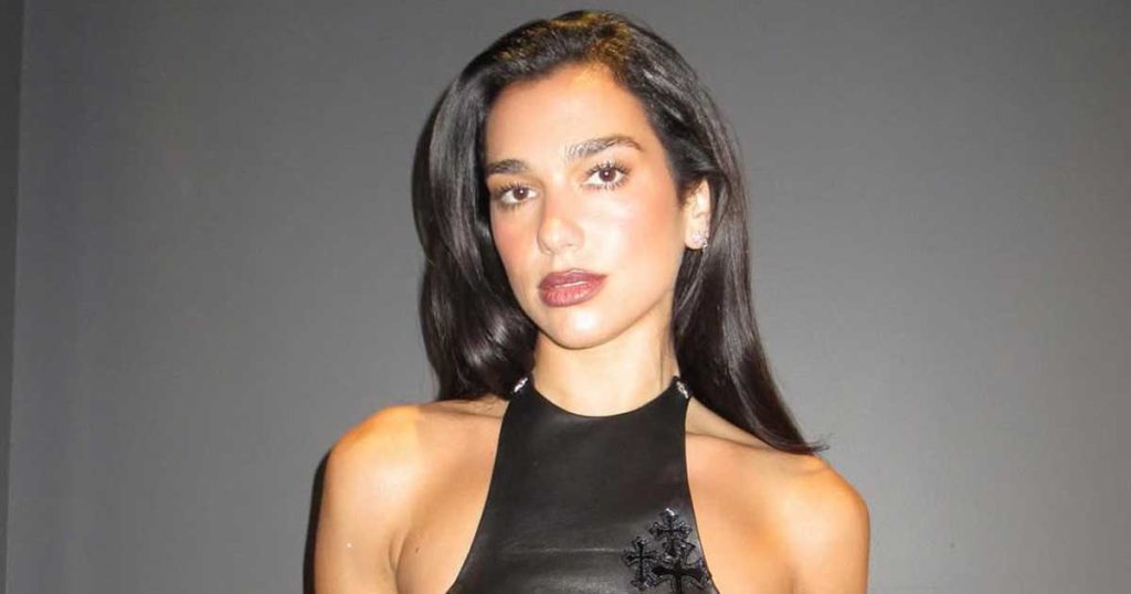 Dua Lipa Sizzles In Sultry Lace Valentino Catsuit To Close Out 2024