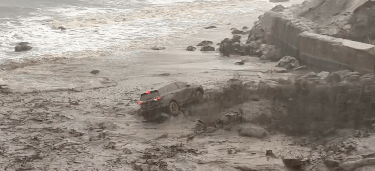 News Video Shows Firefighter & Vehicle Swept Into Ocean By Malibu Mudslide