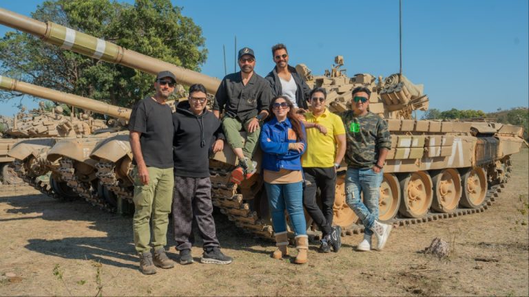 Sunny Deol Joins Varun Dhawan For Film’s Jhansi Schedule, Poses With Bhushan Kumar & Team In BTS Photo